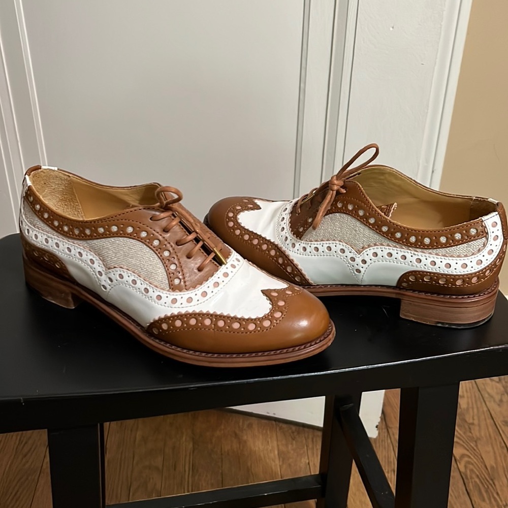 Brown and white leather wingtips